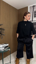 BERMUDA IN TUTA NERO