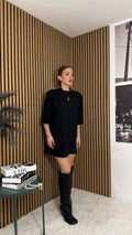 MAGLIA CON SPALLINE NERA